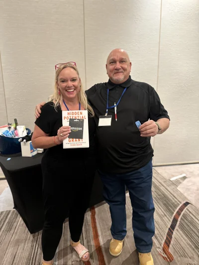 Black Sheep Broker agents sharing creative deal experiences at a real community event